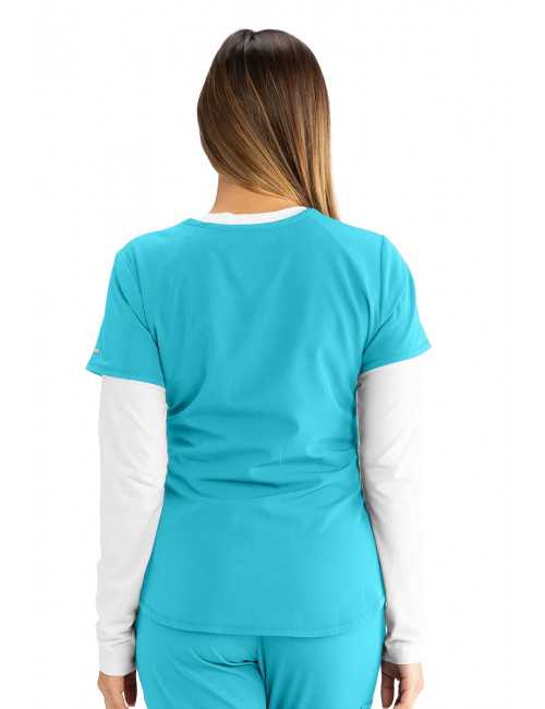 Blouse médicale femme, couleur turquoise vue de dos, collection "Skechers" (SK101-)