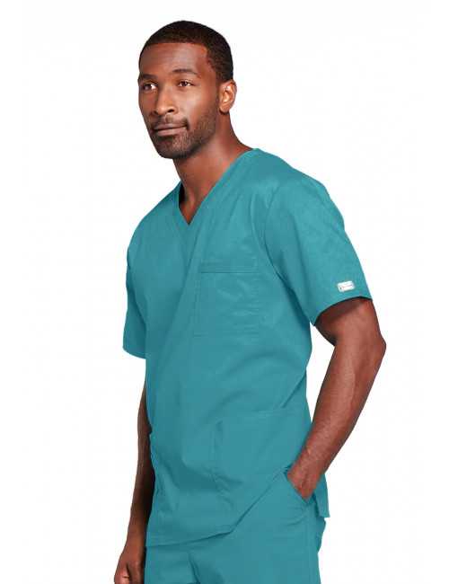 Blouse médicale Unisexe Cherokee, collection "Core Stretch" (4725) teal blue gauche